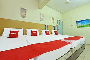 Spot On 90625 Super Green Grass Hotel