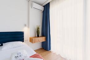 Next Orange Aparthotel Official
