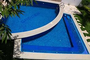 Hotel Garden Suites Tonlá