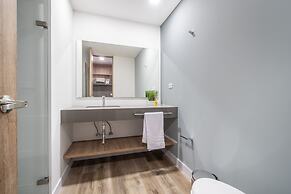 Apartment Go Living & Suites by HOUSY HOST