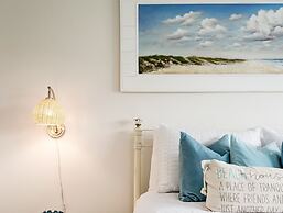 Watercolor Sky Beach House 4 Bedroom Home by RedAwning