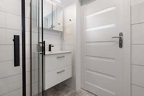 Wrzosowo Cosy Apartment by Renters