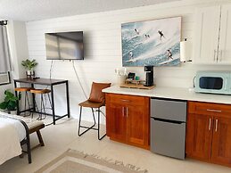 Modern Surf Chic Studio Condo by RedAwning
