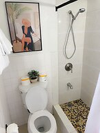 Modern Surf Chic Studio Condo by RedAwning