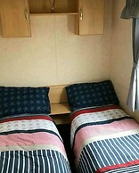 Captivating Three Bedroom Caravan tv in Each Room