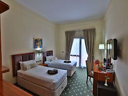 Kenenisa.. Oasis International Hotel