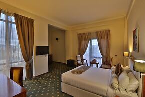 Kenenisa.. Oasis International Hotel