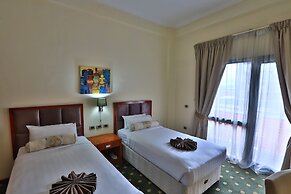Kenenisa.. Oasis International Hotel