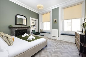 JOIVY Homely 1-Bed Flat By St Giles W/ Desk