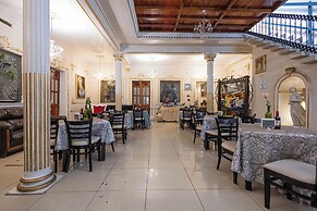 Capital O Hotel Patio Pombo