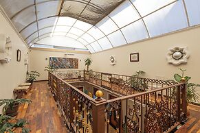 Capital O Hotel Patio Pombo