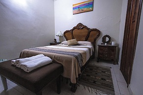 Capital O Hotel Patio Pombo