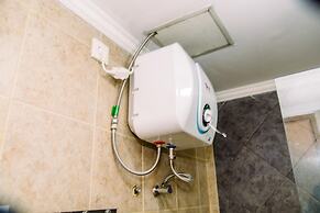 Homey And Serene 2Br At Great Western Resort Apartment