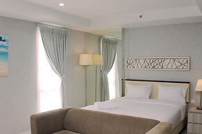 Big And Cozy Studio At Azalea Suites Apartment