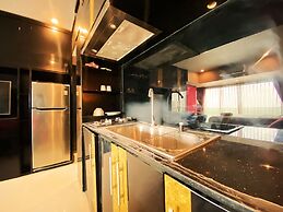 Clean And Comfy Studio Room At Tamansari La Grande Apartment