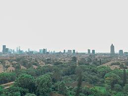 Cozy Studio Apartment At Woodland Park Residence