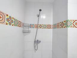 Simple And Homey Studio Room At Paltrow Apartment