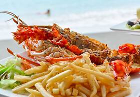 Sand And Tan Beach Hotel