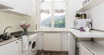 JOIVY Garden Oasis: 1BR Apt w/ Balcony & Parking