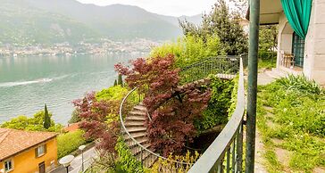 JOIVY Garden Oasis: 1BR Apt w/ Balcony & Parking