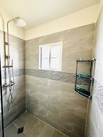 Escape to Paradise Brand New Bungalow With Ocean View in Discovery Bay