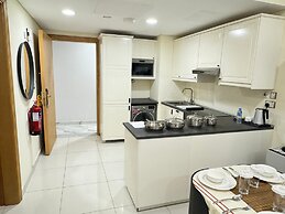 Al Manzil Residence & Suites