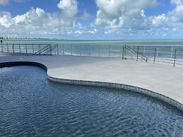 Bela Hospedagem - Vista piscina e mar