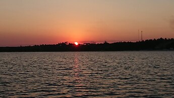 Log Cabin On And Overlooking a 9km Lagoon