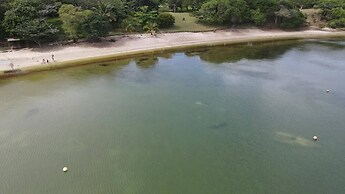 Log Cabin On And Overlooking a 9km Lagoon
