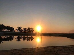 Log Cabin On And Overlooking a 9km Lagoon