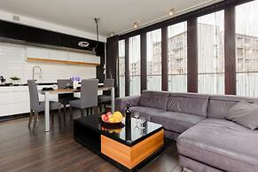 Warsaw Riverside Apartment by Renters