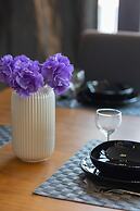 Warsaw Riverside Apartment by Renters