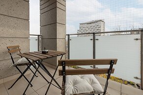 Warsaw Riverside Apartment by Renters