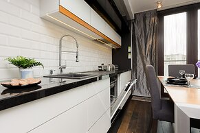 Warsaw Riverside Apartment by Renters