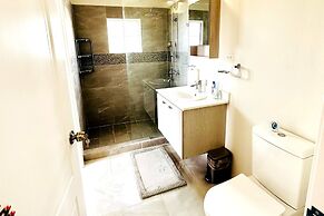 Escape to Paradise: Brand New Bungalow With Ocean View in Discovery Ba