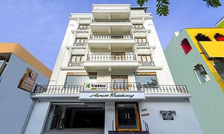 Treebo Aaravi Residency, 800 Mtrs From Promenade Beach
