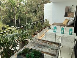 The Oasis Apartments and Treetop Houses