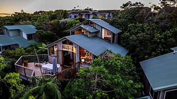The Oasis Apartments and Treetop Houses