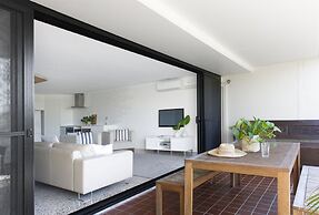 The Oasis Apartments and Treetop Houses