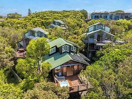 The Oasis Apartments and Treetop Houses
