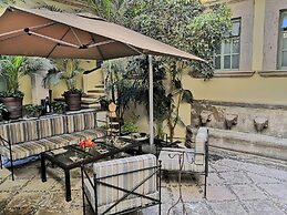 El Palomar Hotel