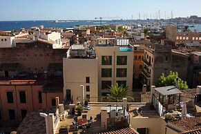 Petit Palace Hotel Tres