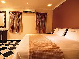 Meenakshi's Sunshine Hotel