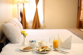 Meenakshi's Sunshine Hotel