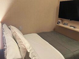 Fast Sleep Guarulhos by Slaviero Hotéis