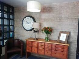 Filatelia Suites & Travel