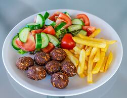 A. Maos Hotel Apartments