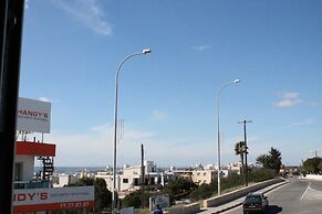 A. Maos Hotel Apartments