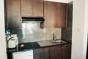 A. Maos Hotel Apartments