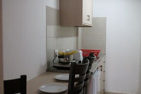 A. Maos Hotel Apartments